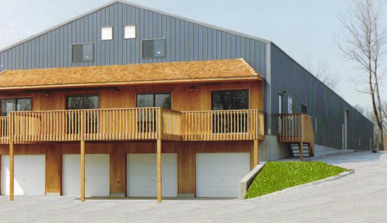 Historical photo of Zip Pneumatics, Inc., featuring Bobby Sims and his sons with pneumatic tube systems